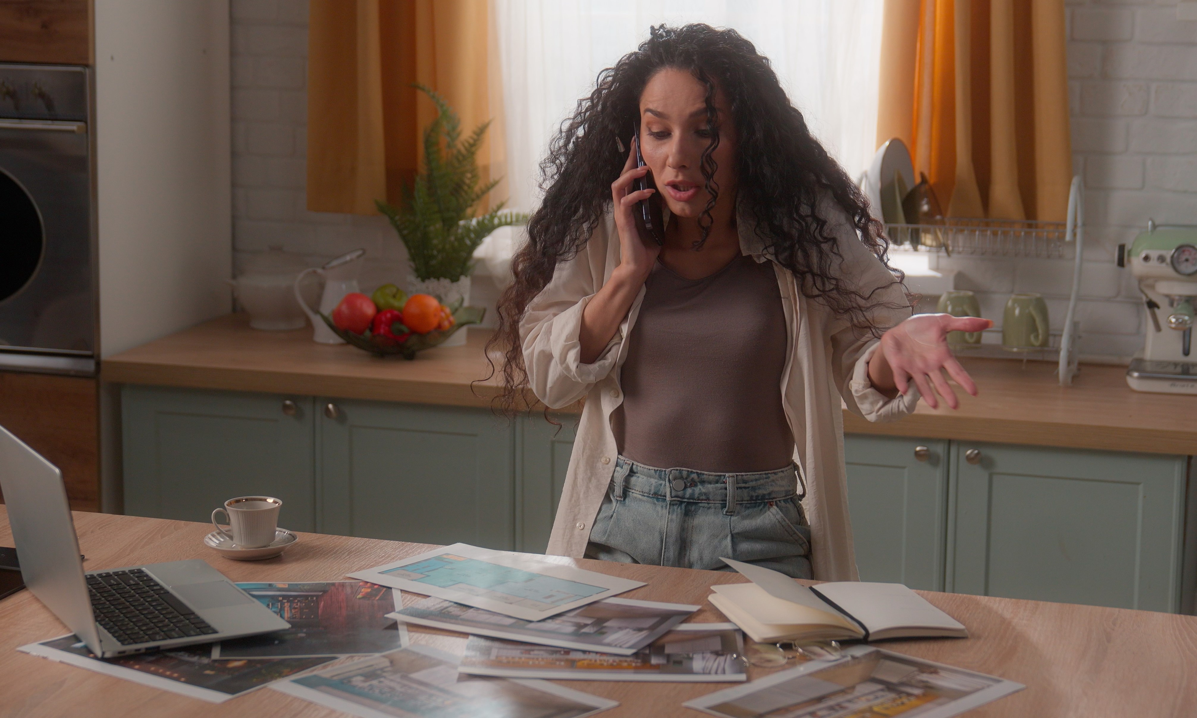 Gazundering is Back. Or is it? A photograph of a homeowner who is stressed on a phonecall having received bad news